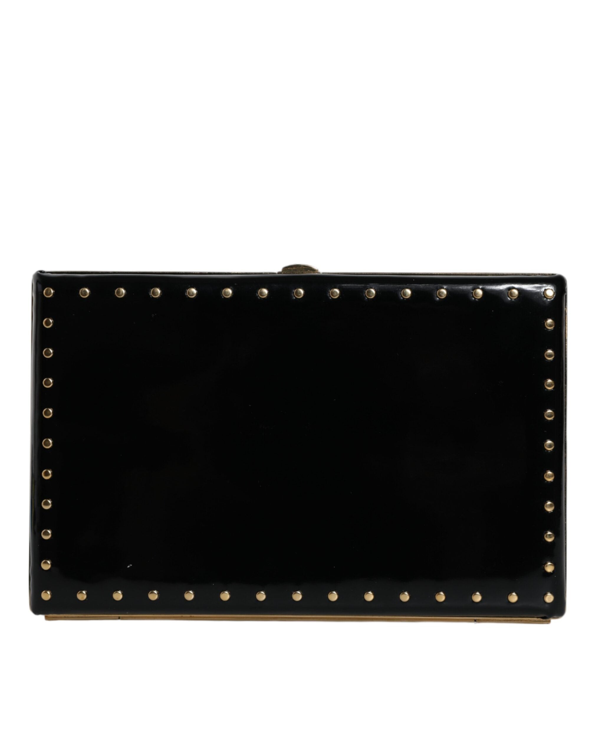 Sac clutch noir en cuir Dolce & Gabbana avec studs et cadre doré, idéal pour soirée élégante.