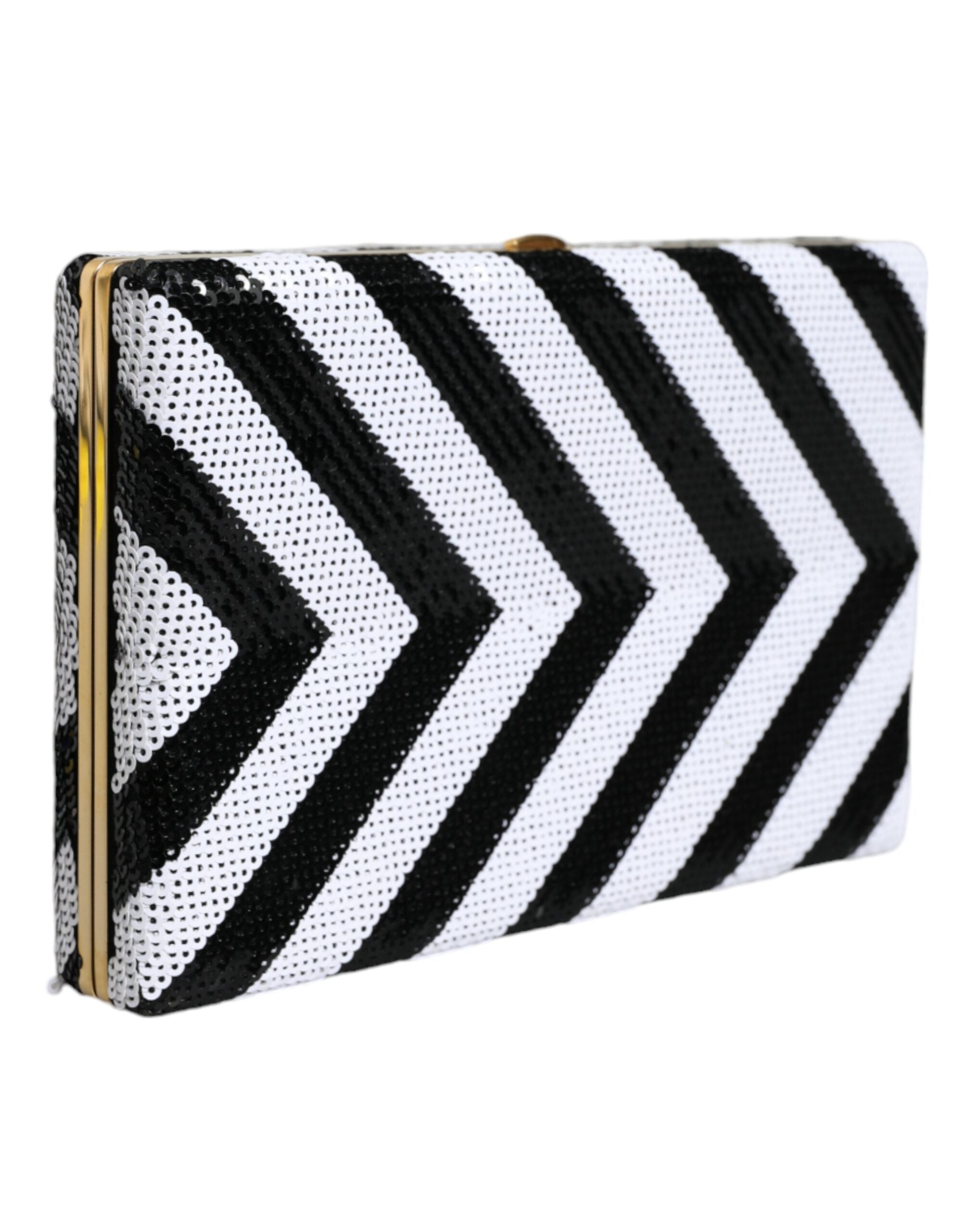 Pochette de soirée Dolce & Gabbana noire, blanche et dorée avec cadre élégant, idéale pour soirée ou fête.