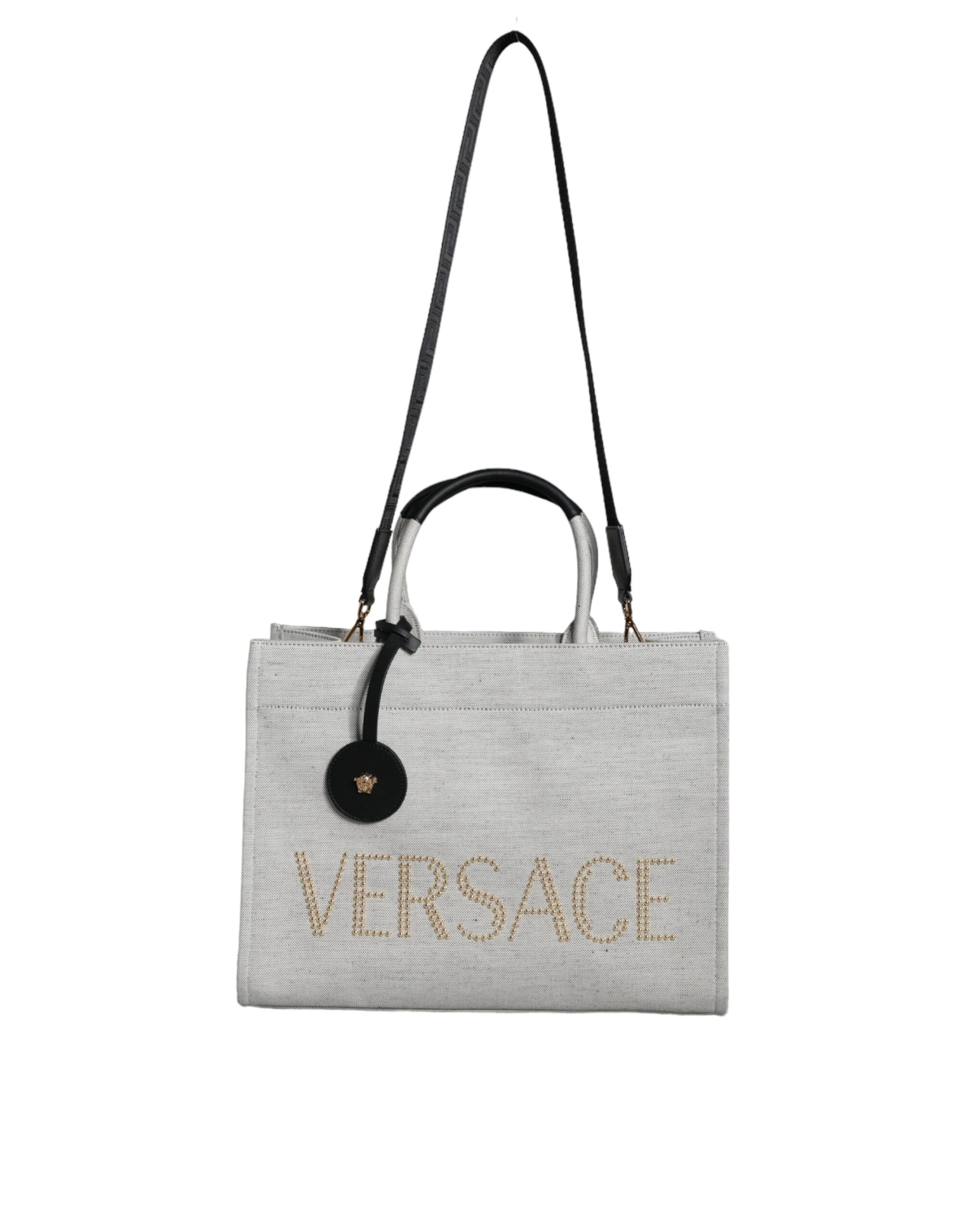Sac cabas à main Versace blanc en toile et cuir avec logo, bandoulière, élégant et spacieux pour femmes.