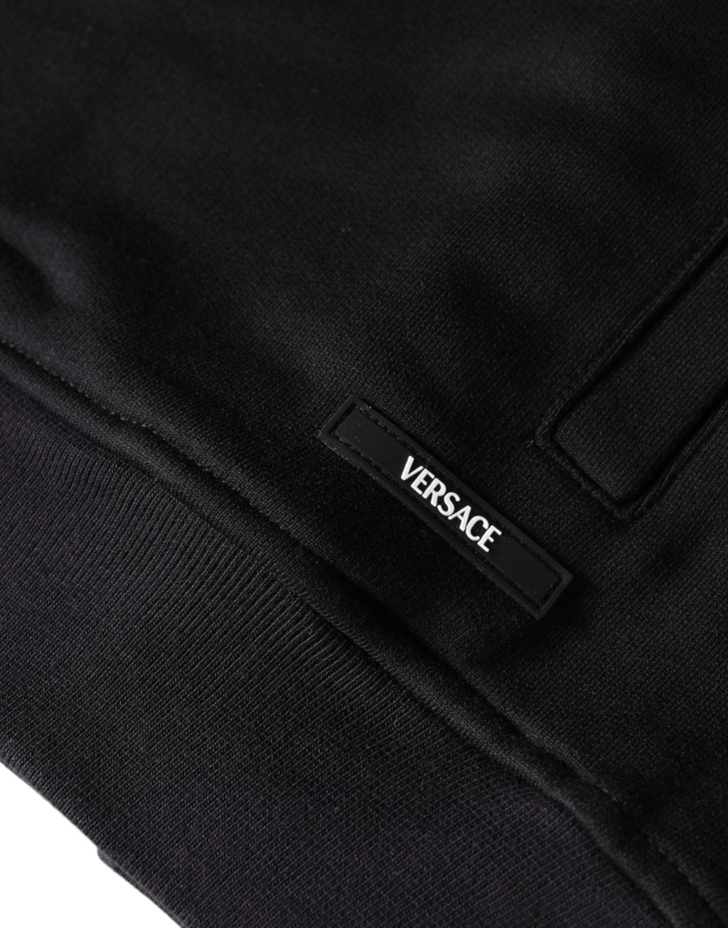 Sweat à capuche en coton noir Versace avec motif Medusa, fermeture éclair complète, style décontracté et élégant.