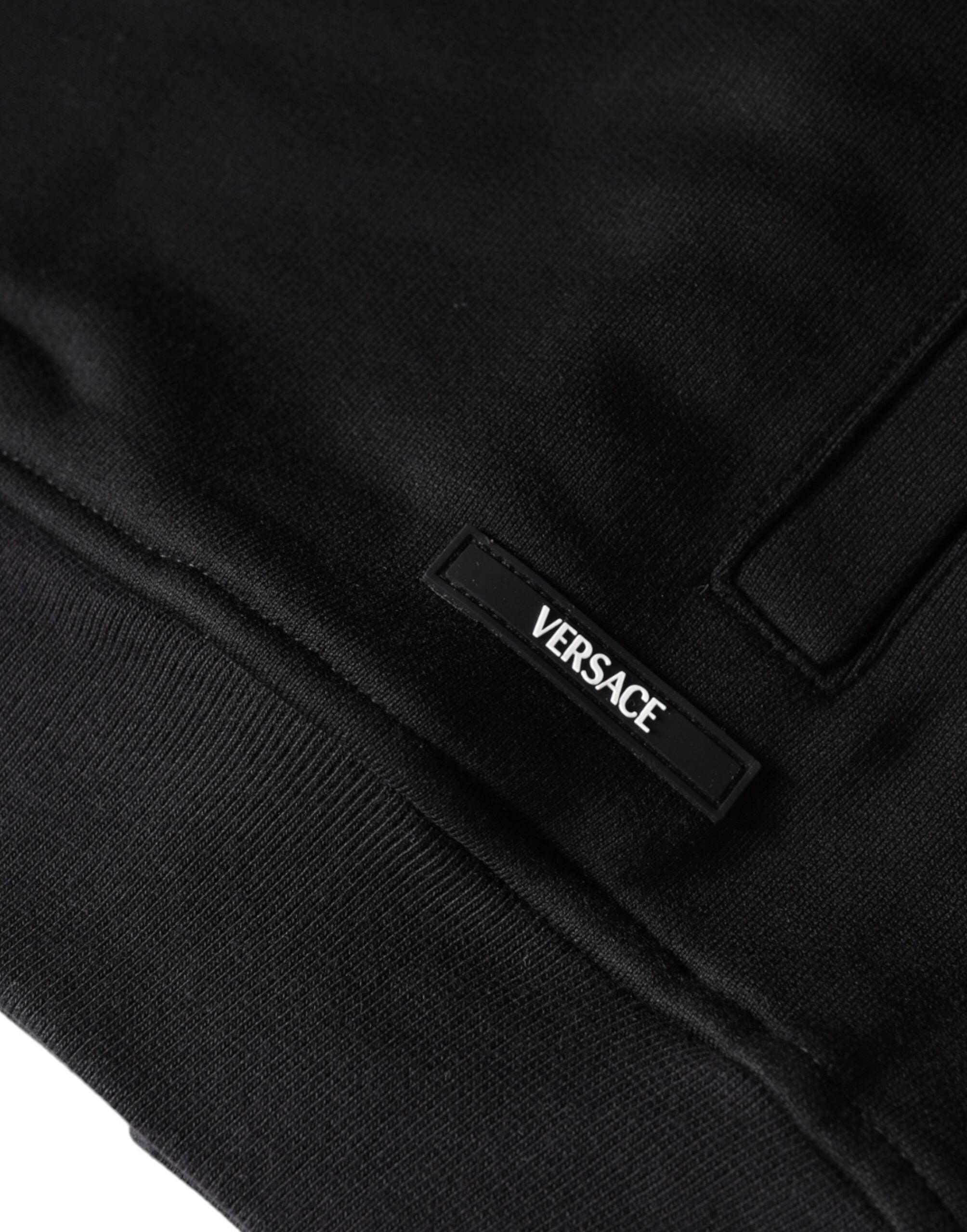 Sweat à capuche en coton noir Versace avec motif Medusa, fermeture éclair complète, style décontracté et élégant.
