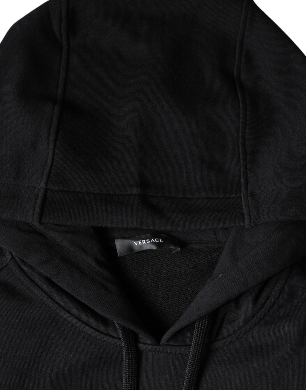 Sweat à capuche en coton noir Versace avec motif Medusa, style décontracté et élégant, visible sur l'image.