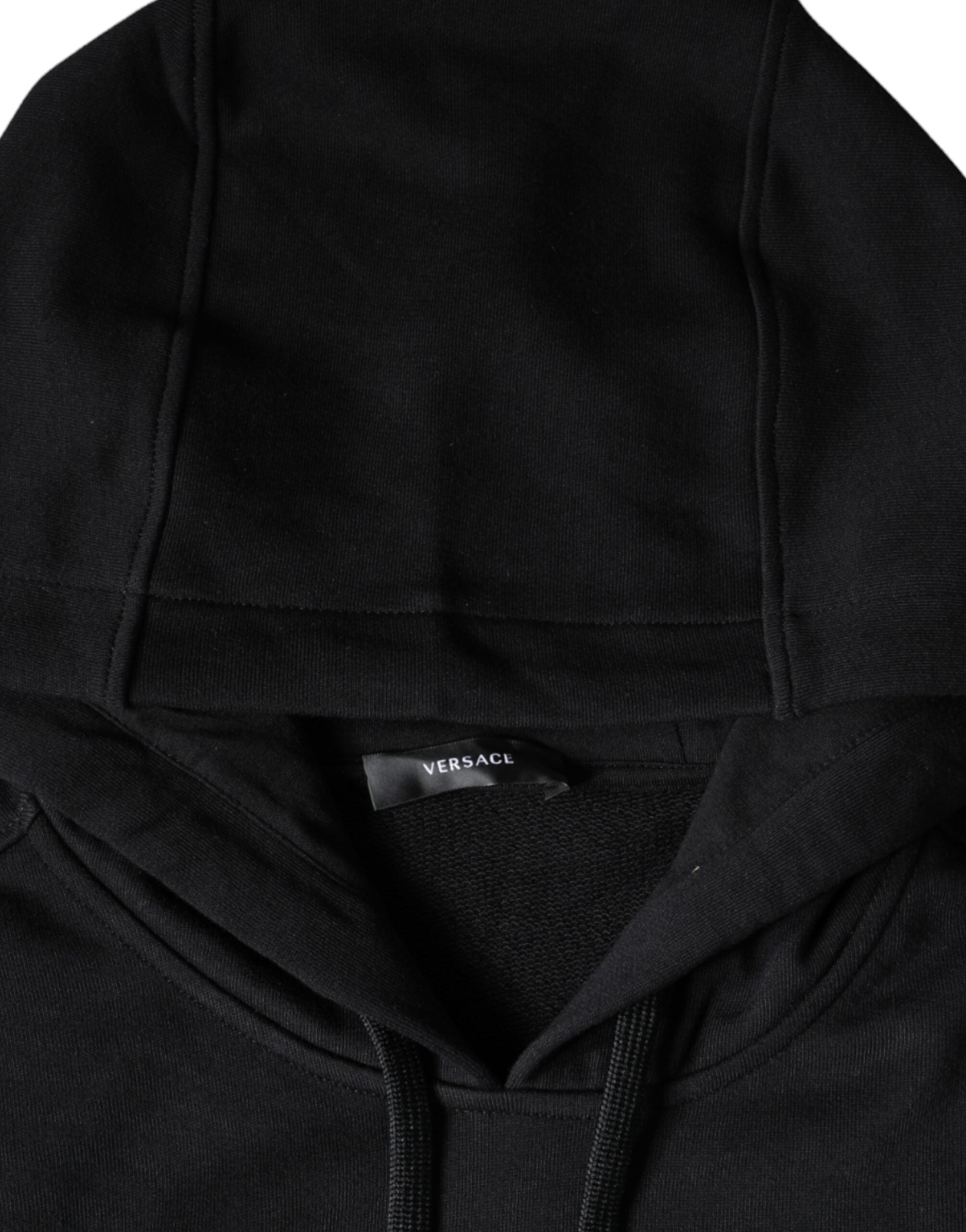 Sweat à capuche en coton noir Versace avec motif Medusa, style décontracté et élégant, visible sur l'image.