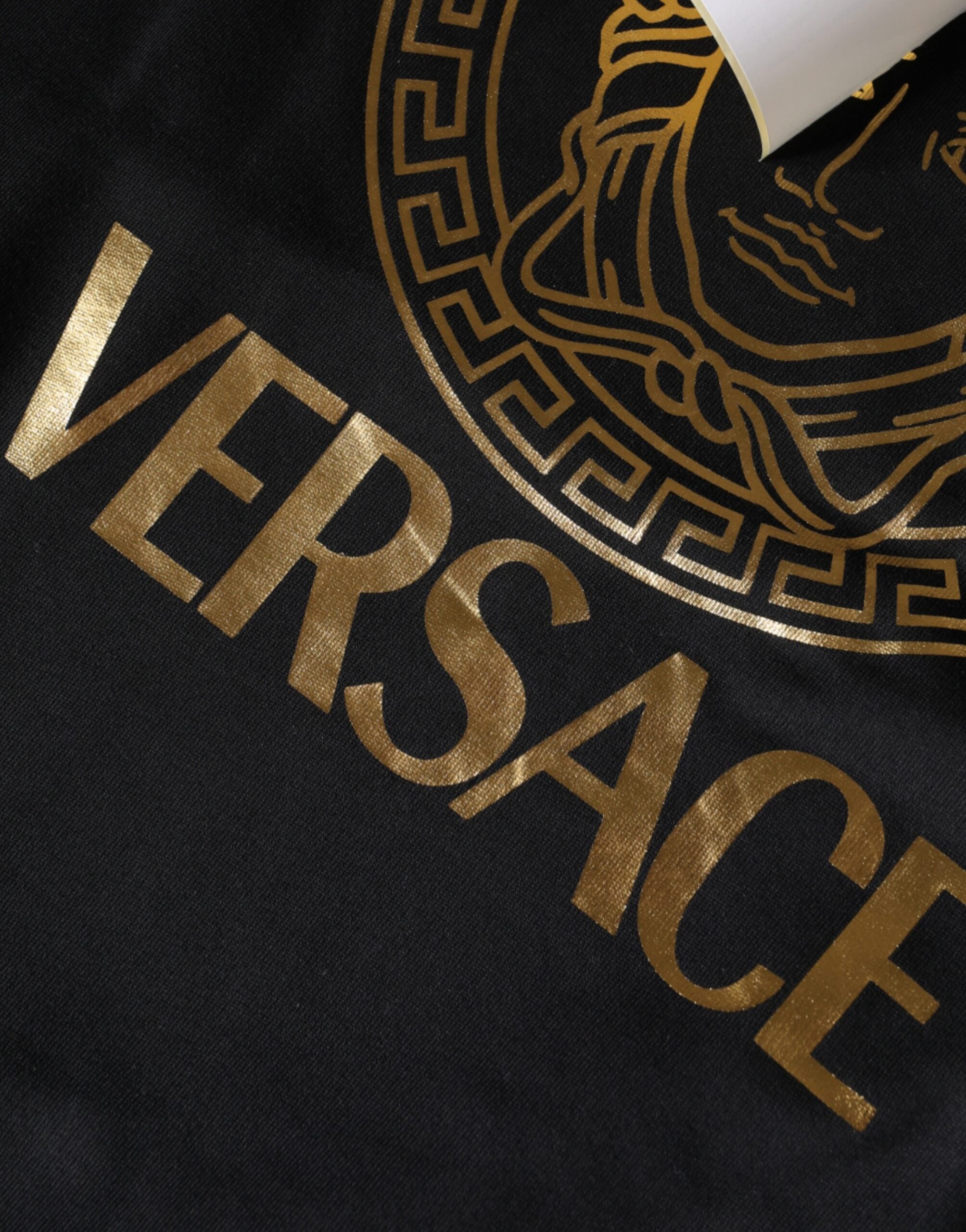 Sweat à capuche en coton noir Versace avec imprimé Medusa, pull-over élégant et confortable.