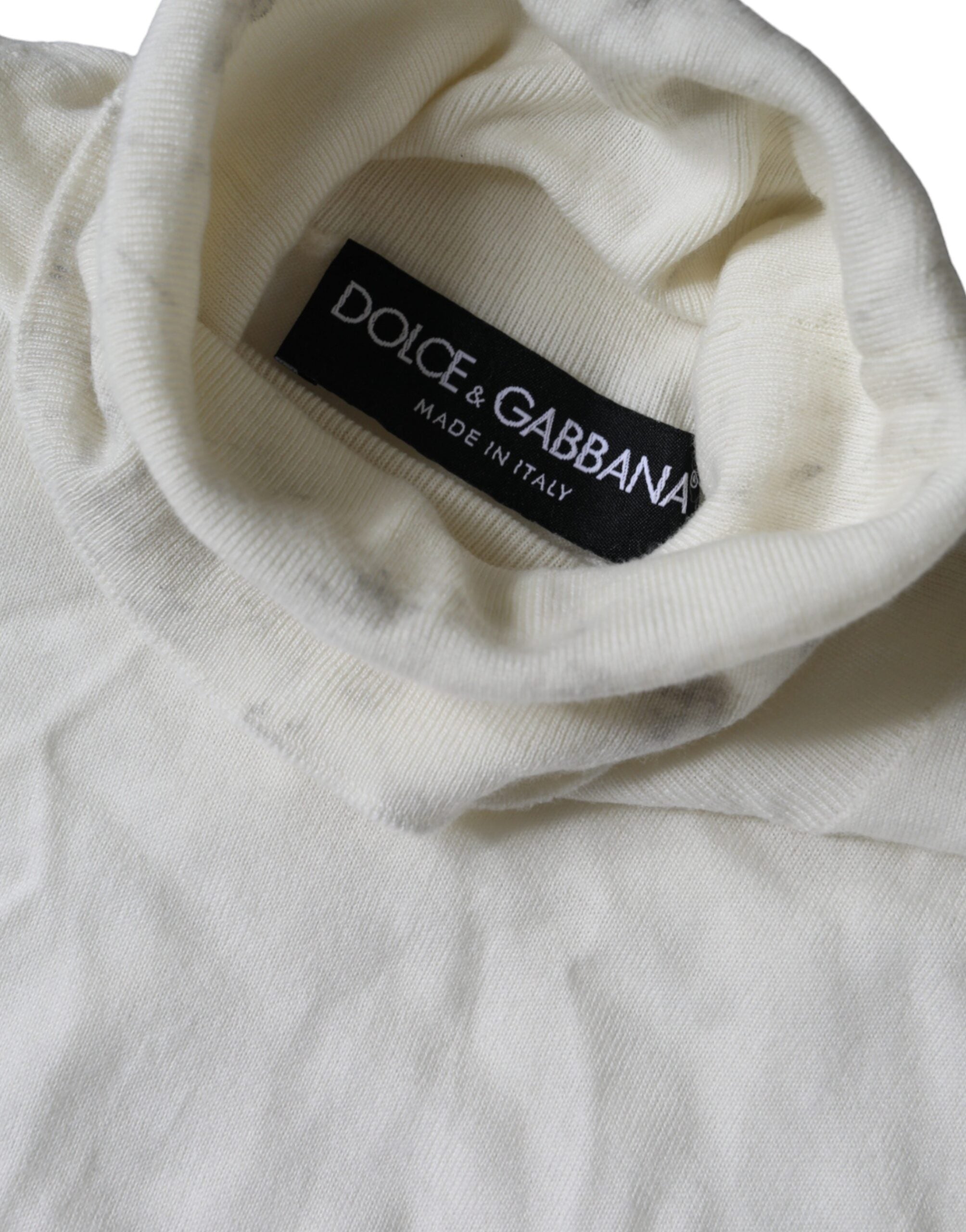 Pull en laine blanc cassé Dolce & Gabbana à col roulé, doux et chaud, adapté pour un look élégant et confortable.