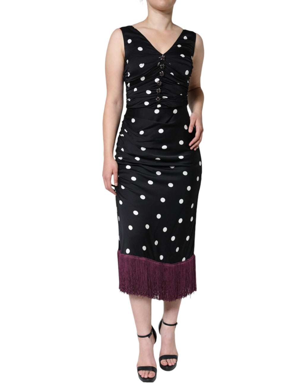 Robe midi en soie noire à pois Dolce & Gabbana avec décolleté en V et franges, style élégant et sophistiqué.