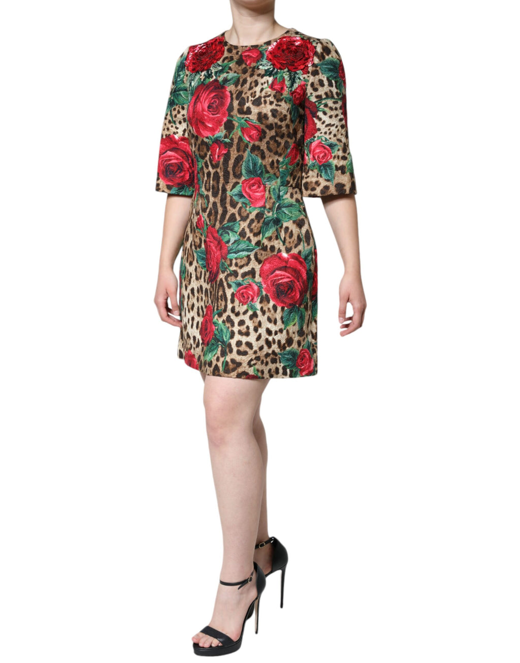 Robe en coton Dolce & Gabbana à coupe évasée, motif léopard marron, roses rouges, style élégant et floral.