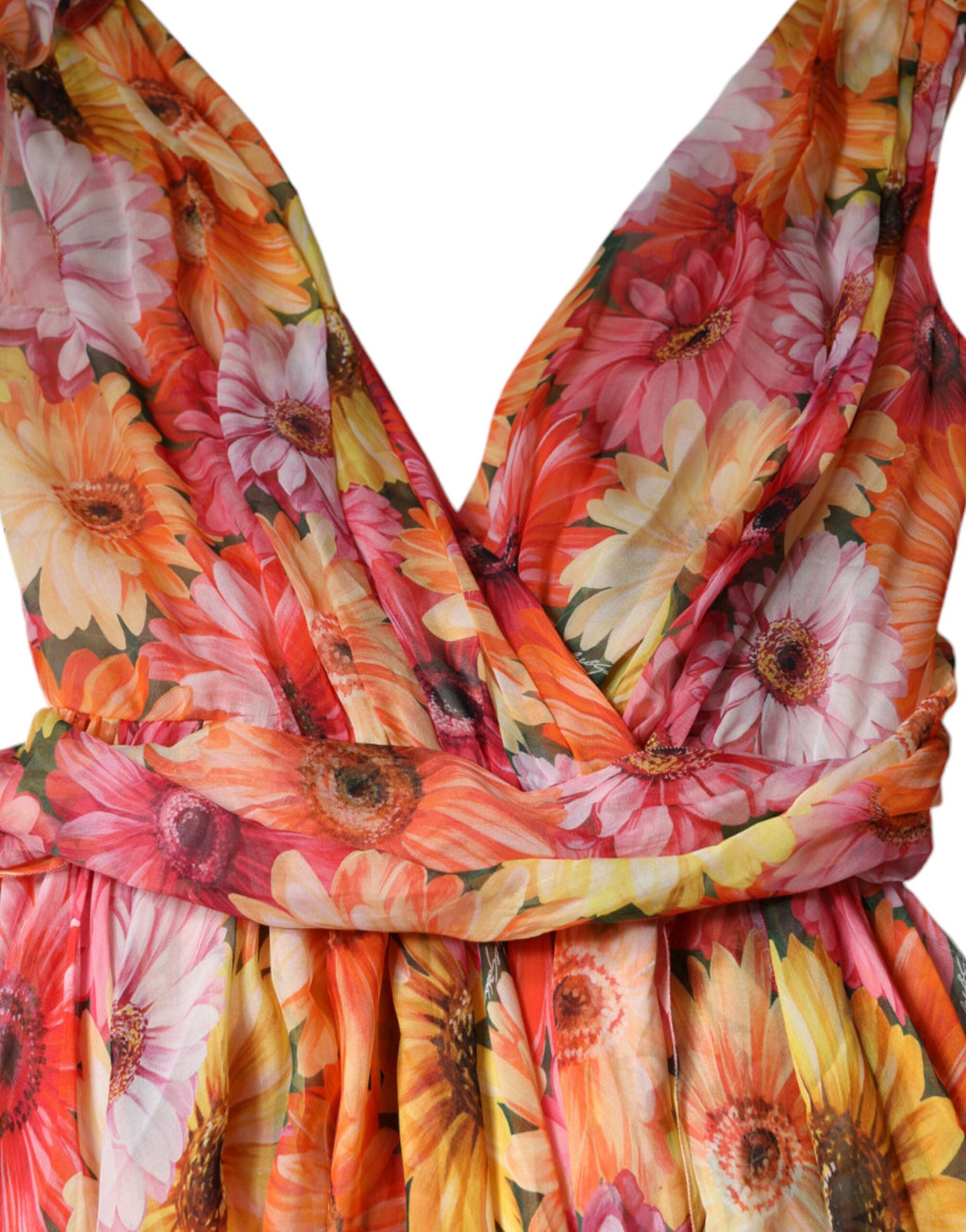 Robe midi sans manches Dolce & Gabbana à fleurs multicolores et col en V, élégante et estivale, vue de face.