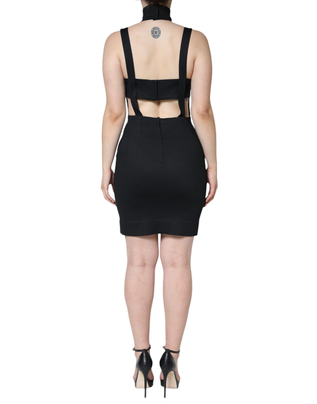 Robe courte noire sans manches de corps Dolce & Gabbana avec découpes élégantes, ajustée et sophistiquée.