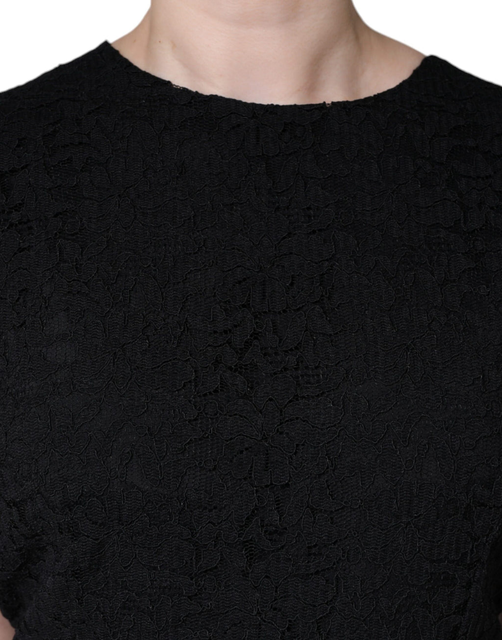Robe noire en coton Dolce & Gabbana, coupe ajustée et longueur genou, vêtement élégant et chic pour femmes.