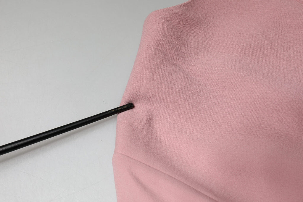Robe Dolce & Gabbana rose en viscose à coupe A, manches 3/4, style élégant et féminin.