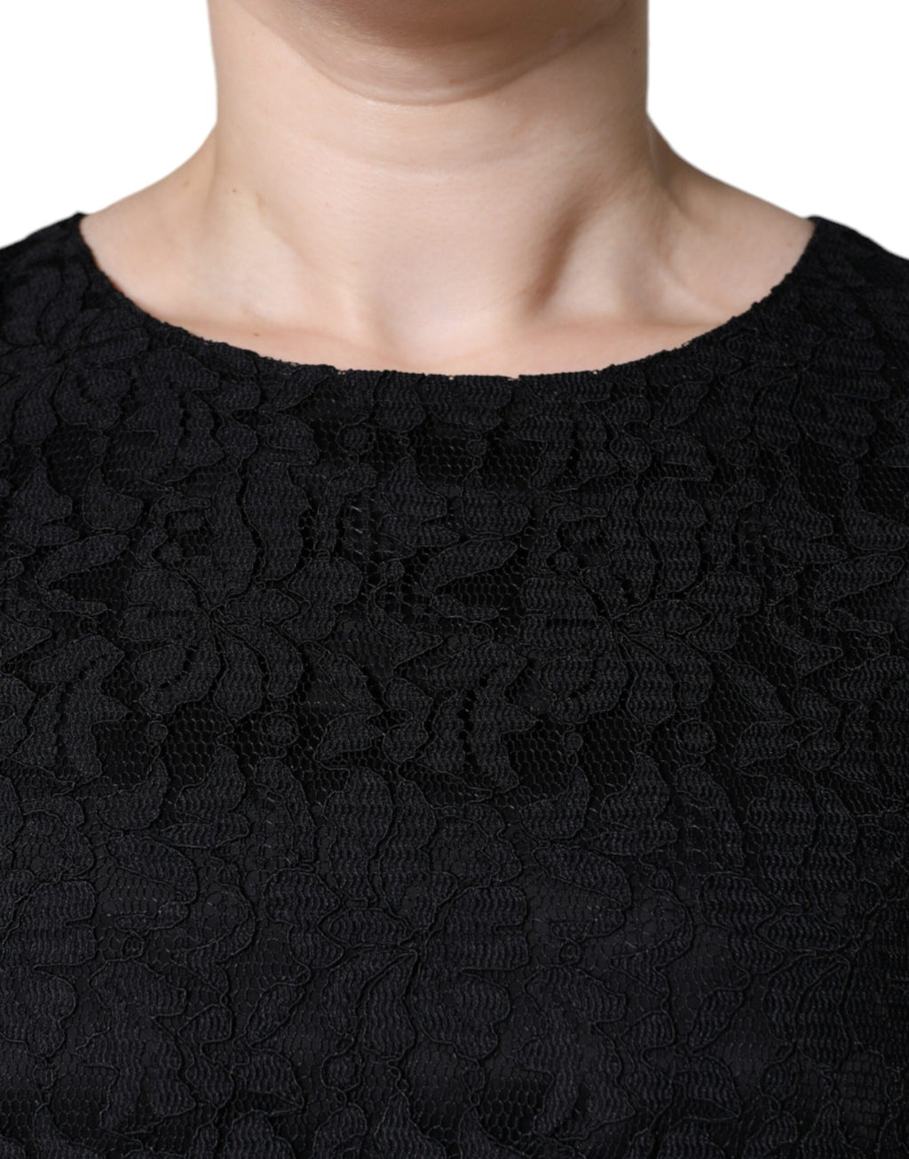 Robe courte sans manches Dolce & Gabbana en dentelle florale noire, coupe ajustée et élégante pour femme.