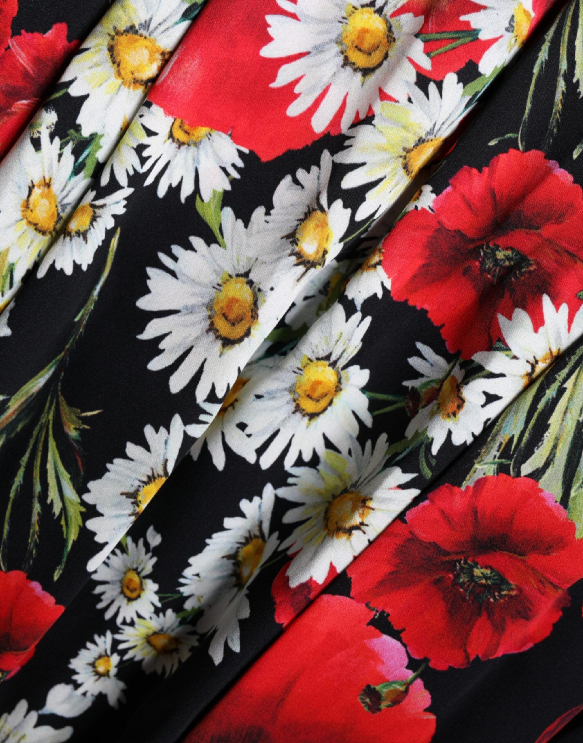 Robe longue sans manches en soie noire à fleurs Dolce & Gabbana, élégant vêtement de soirée avec détails floraux raffinés.