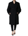 Manteau trench noir Dolce & Gabbana à double boutonnage, en tissu élégant, avec ceinture et col classique.