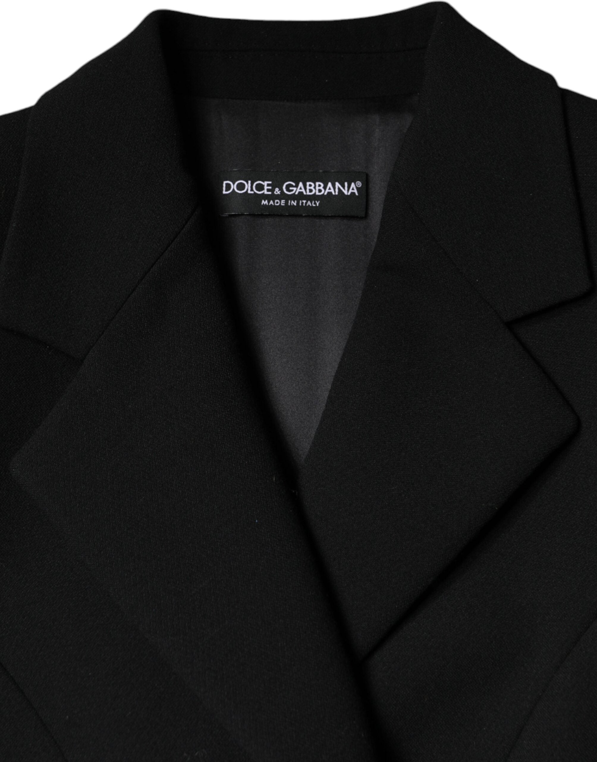 Manteau trench noir à double boutonnage de Dolce & Gabbana, veste élégante en tissu imperméable, avec ceinture et revers classiques.