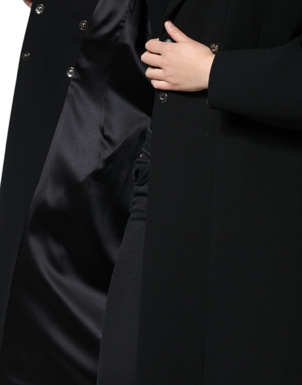 Manteau trench noir à double boutonnage de Dolce & Gabbana, veste élégante en tissu fluide avec ceinture à la taille.