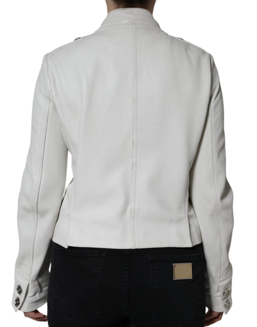 Blazer blanc double boutonnage Dolce & Gabbana en tissu élégant, porté ouvert sur fond neutre.