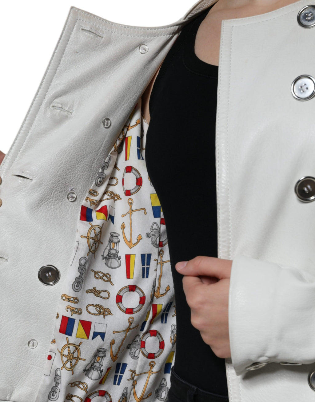 Veste blazer double-breasted blanche Dolce & Gabbana, élégante et classique, portée sur un mannequin.