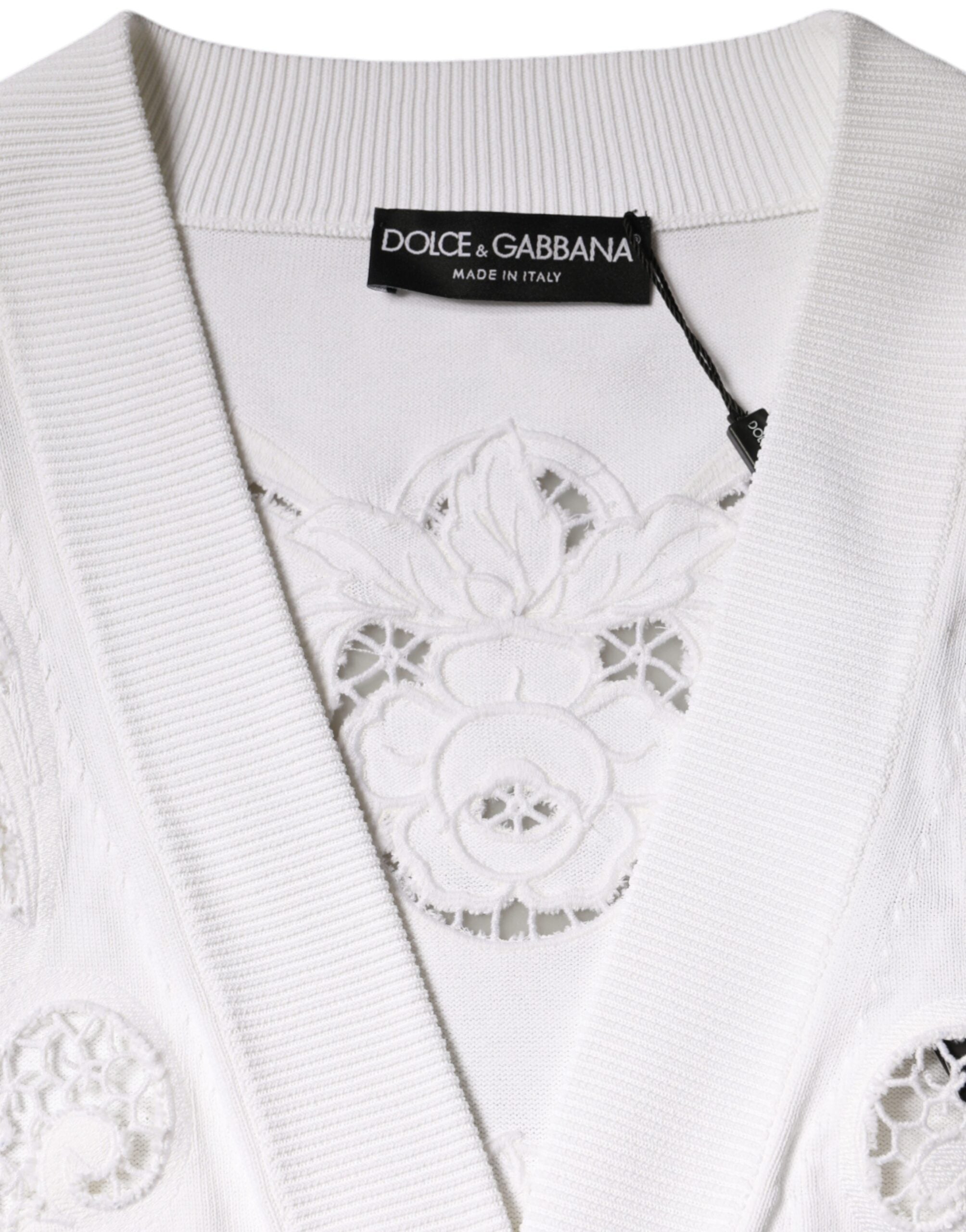 Cardigan blanc Dolce & Gabbana en viscose avec motifs floraux et découpes élégantes, style féminin et sophistiqué.