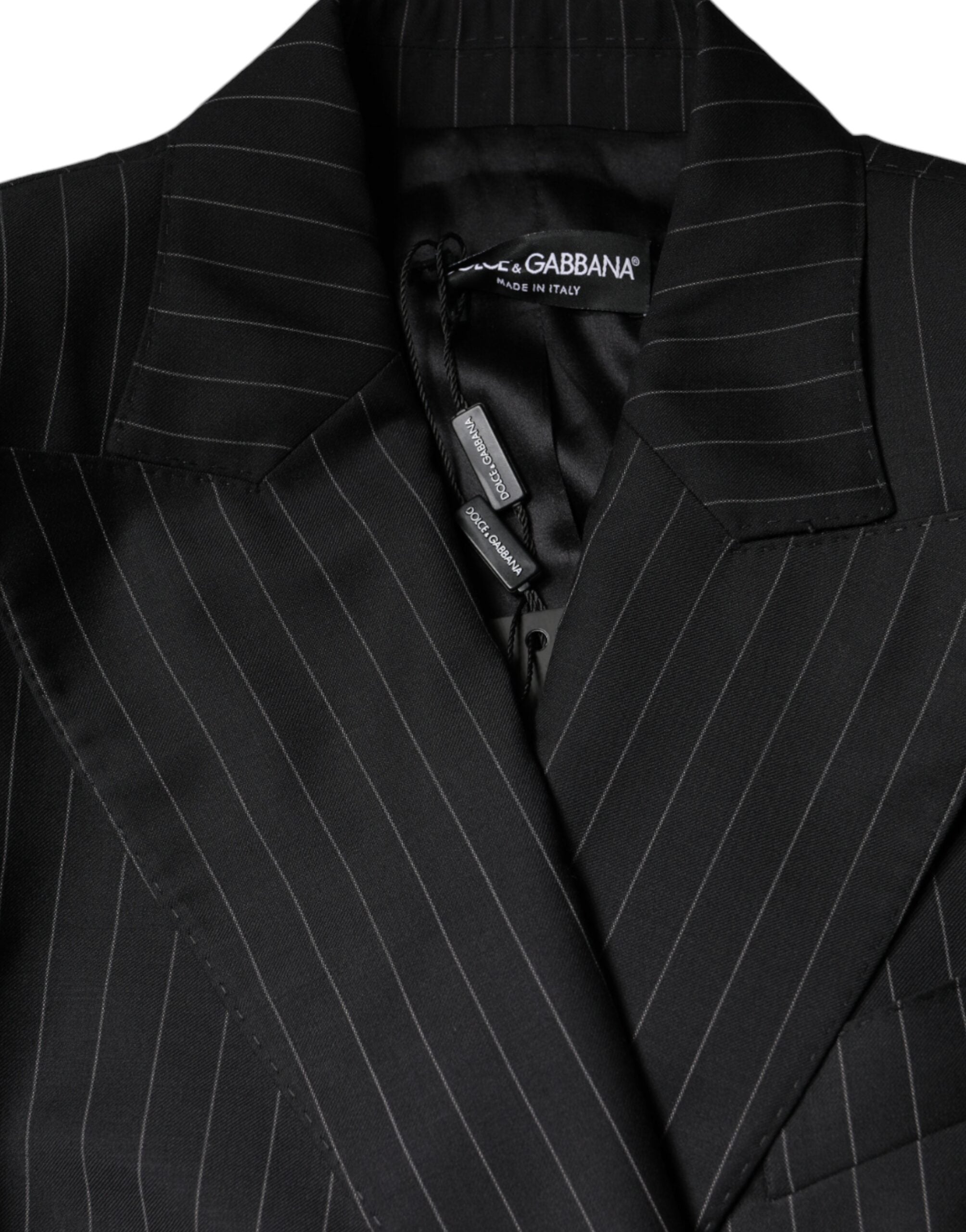 Veste noire à rayures Dolce & Gabbana, manteau double boutonnage élégante avec col classique et coupe sophistiquée.