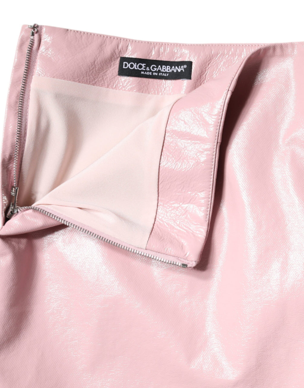 Jupe courte en coton rose brillant de haute taille de la marque Dolce & Gabbana, vue de face.