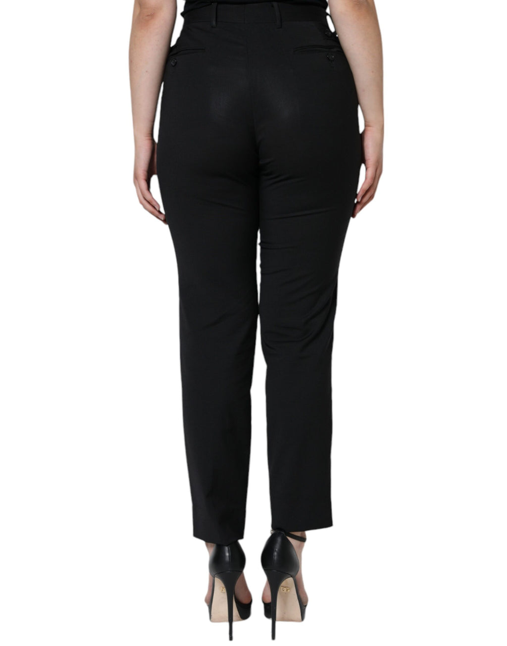 Pantalon taille haute en polyester noir de Dolce & Gabbana, coupe tapered élégante et moderne.