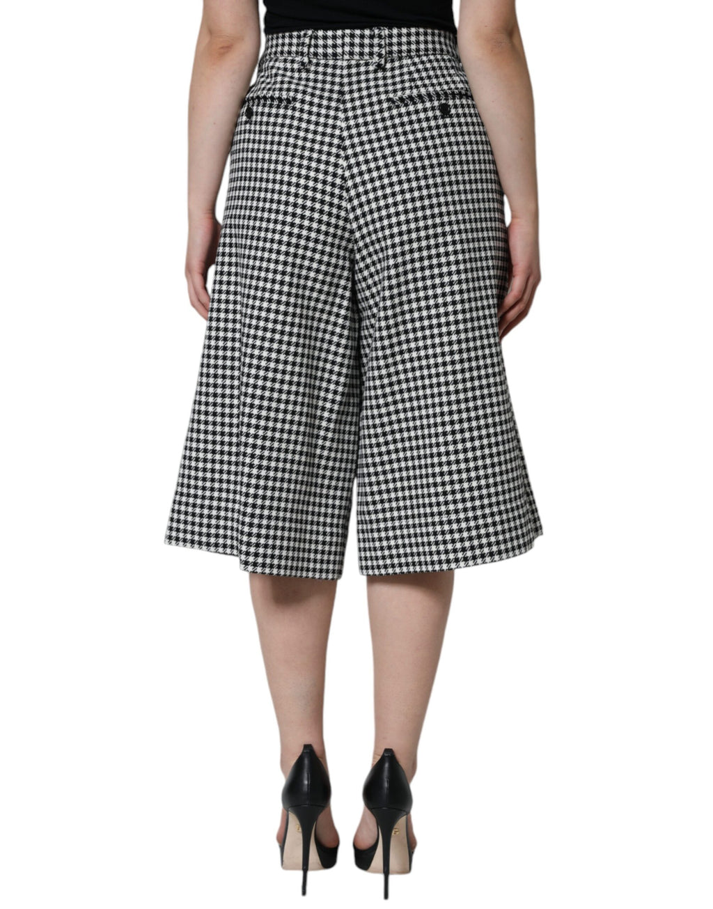 Pantalons cropped à carreaux pied-de-poule noir et blanc de Dolce & Gabbana, coupe ample et jambes larges.