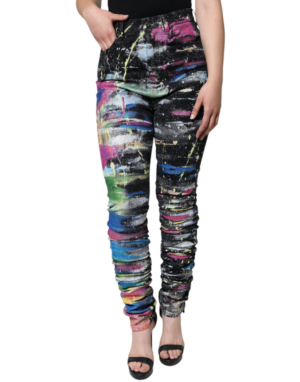 Jeans skinny en coton Dolce & Gabbana à tache multicolore et peinture, style denim slim avec motif artistique vibrant.