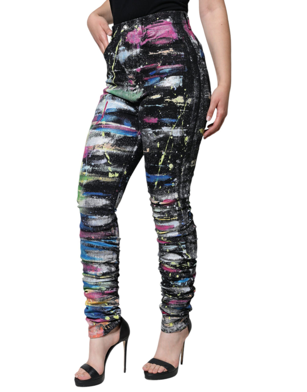 Jean skinny en denim coton multicolore à taches de peinture de Dolce & Gabbana, style moderne et audacieux.