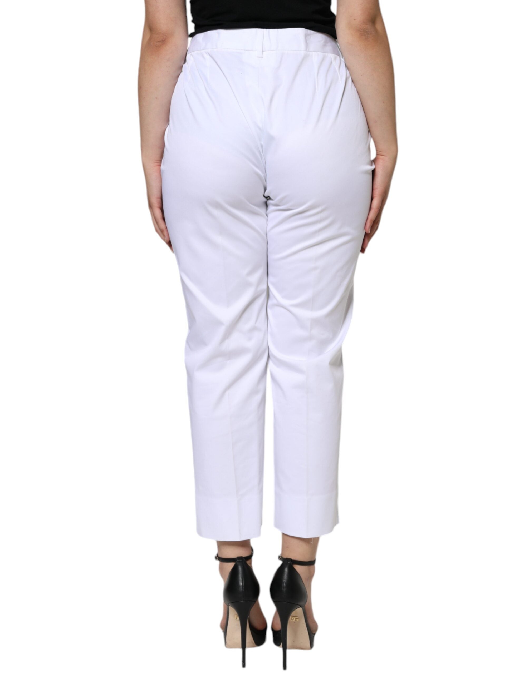 Jeans en coton blanc Dolce & Gabbana, taille mi-haute, coupe tapered, denim, visible sur l'image.