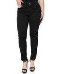 Jeans skinny en coton stretch noir Dolce & Gabbana avec détails en denim et coupe ajustée, vue de face.