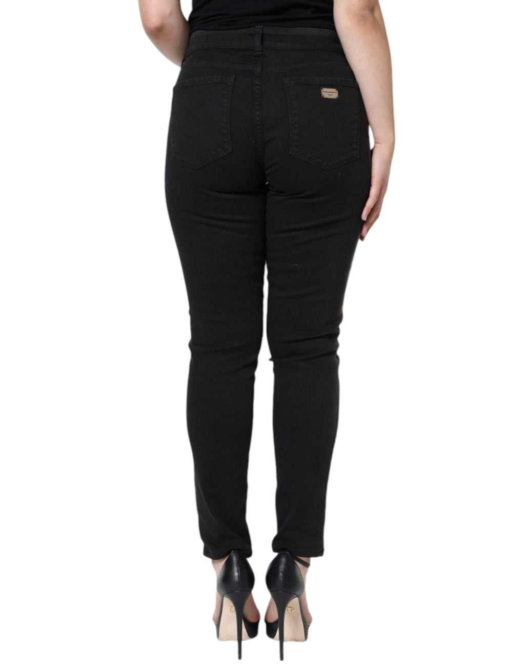 Jeans skinny en denim noir en coton stretch de Dolce & Gabbana, ajustés et modernes, visibles avec fermeture éclair et poches.