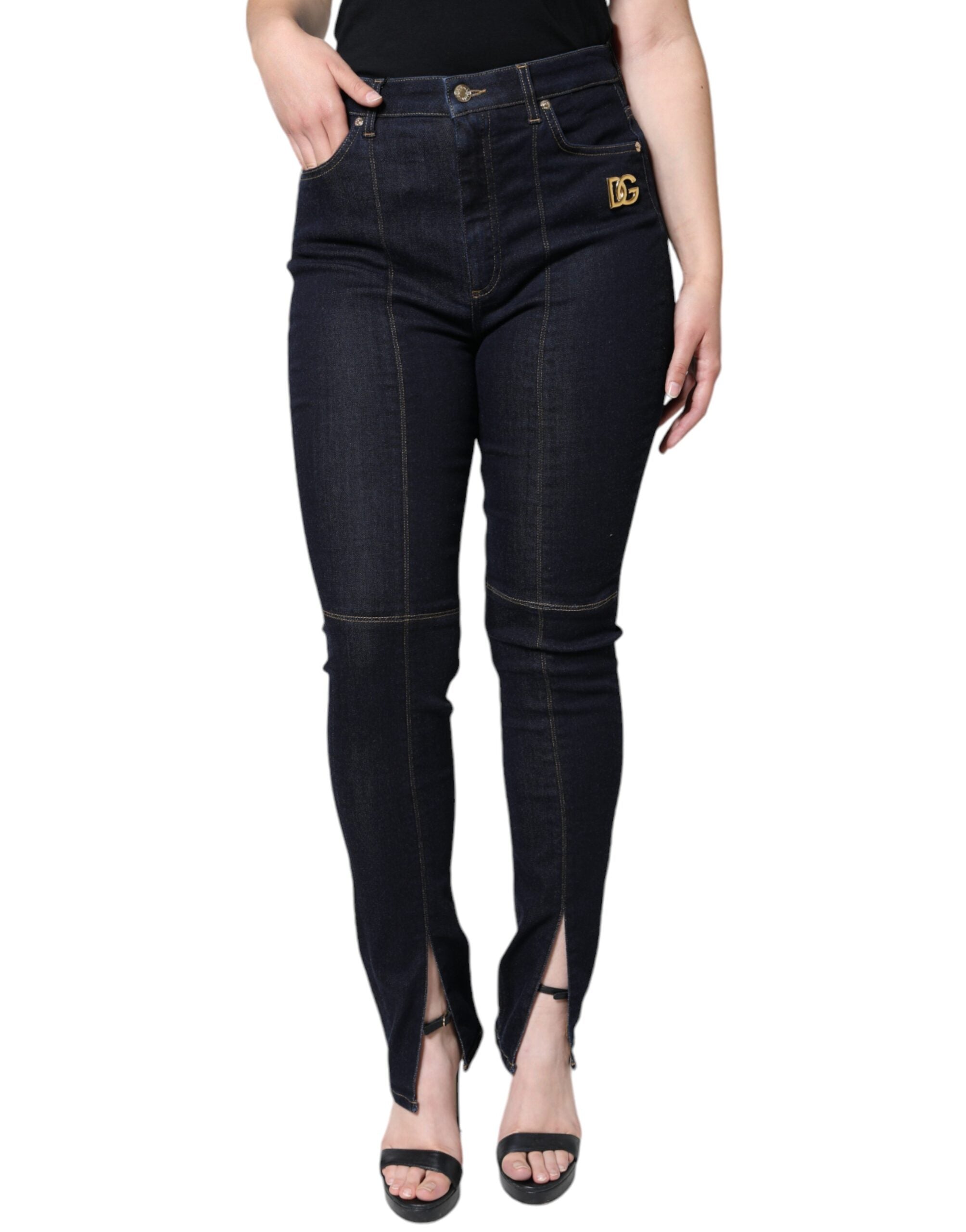 Jean skinny en denim noir en coton mélangé de Dolce & Gabbana, vue de face, avec détails de fermeture et poches.