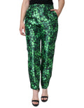 Pantalon en soie satin vert à taille haute Dolce & Gabbana avec coupe tapered, motif trèfle élégant.