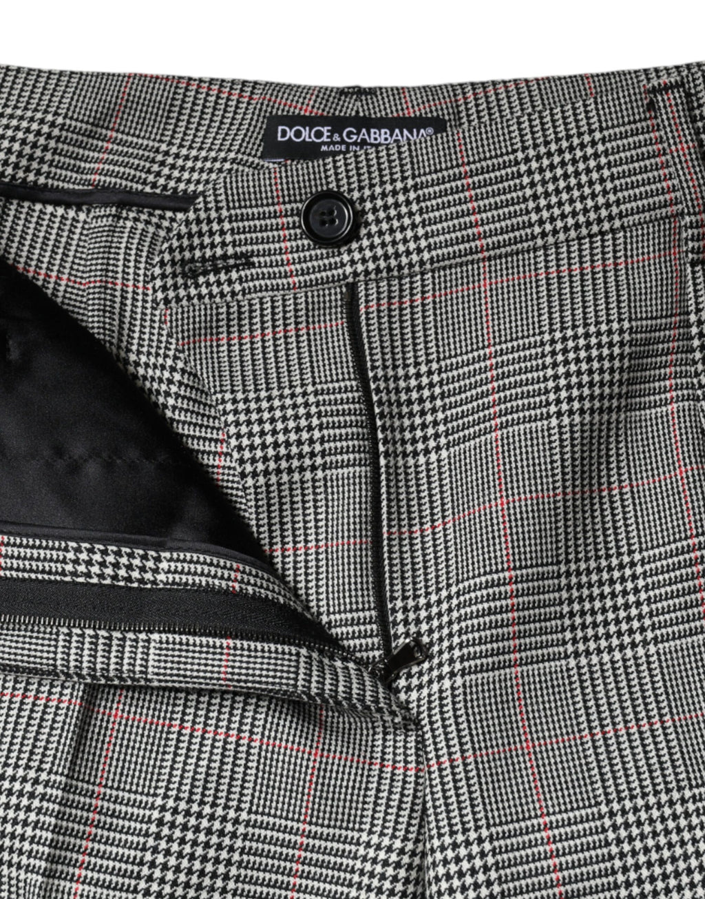 Pantalon femme en laine gris à carreaux Dolce & Gabbana, taille moyenne, coupe tapered, style élégant et confortable.