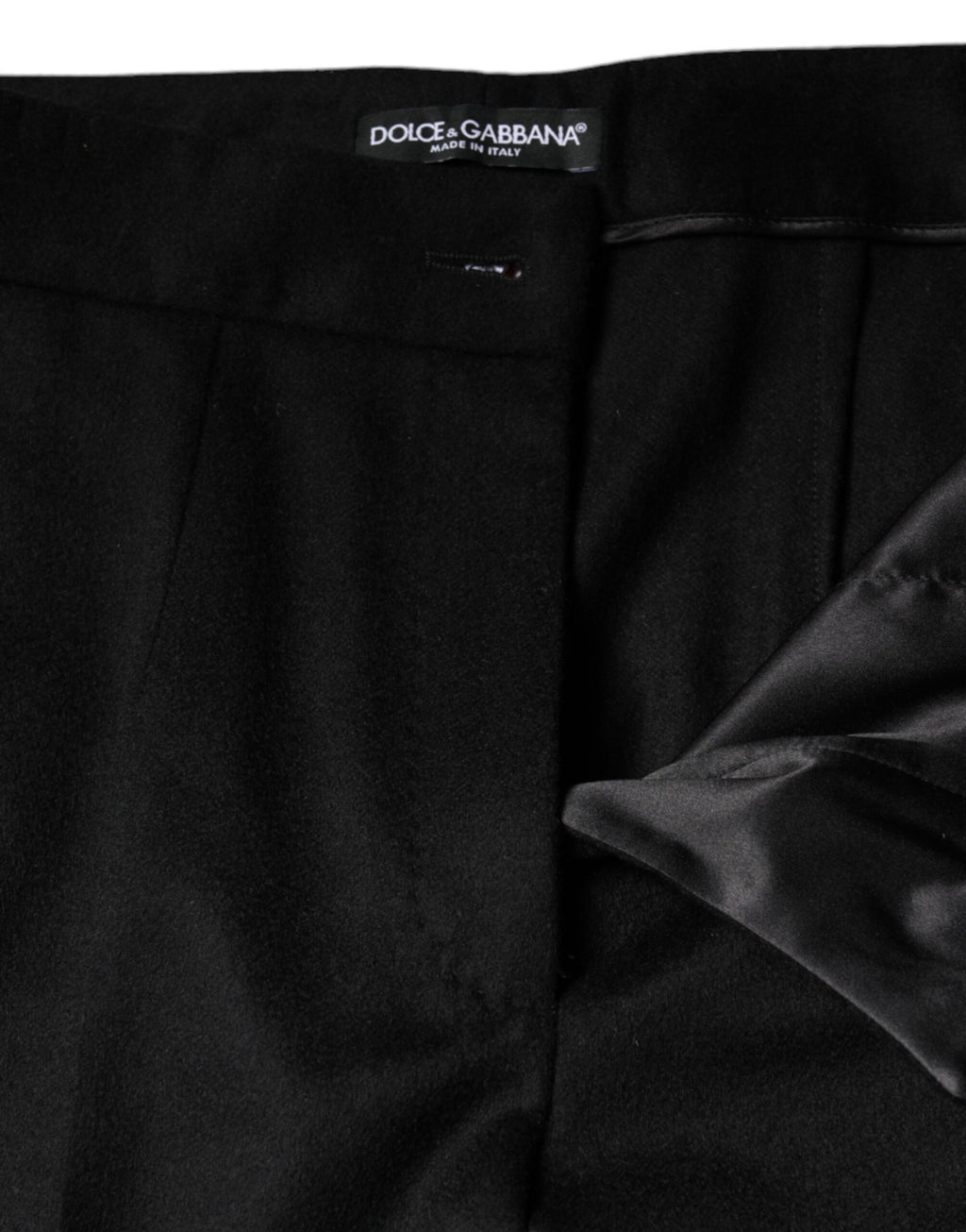 Pantalons femme Dolce & Gabbana en cachemire noir, taille mi-haute et coupe boot cut, visibles sur l'image.
