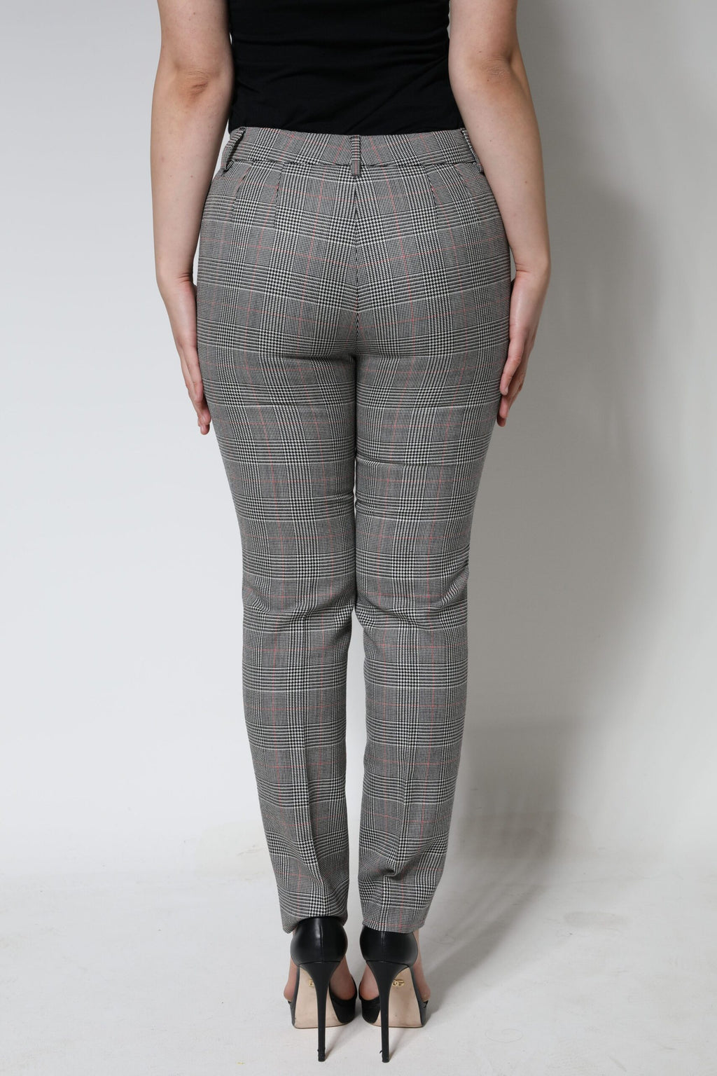 Pantalons femme en laine gris à carreaux, taille moyenne, coupe tapered, de la marque Dolce & Gabbana.