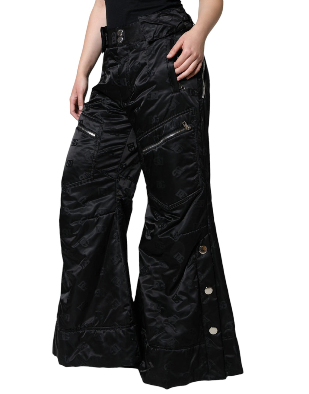 Pantalons femme Dolce & Gabbana à taille haute, en tissu matelassé noir, coupe large et élégante.