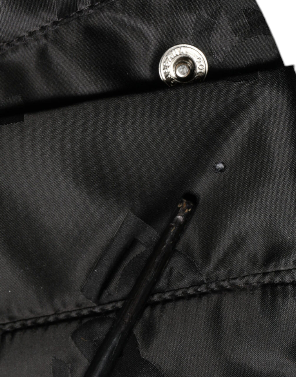 Pantalons femme Dolce & Gabbana noir à taille haute, en tissu matelassé, coupe large et élégante.