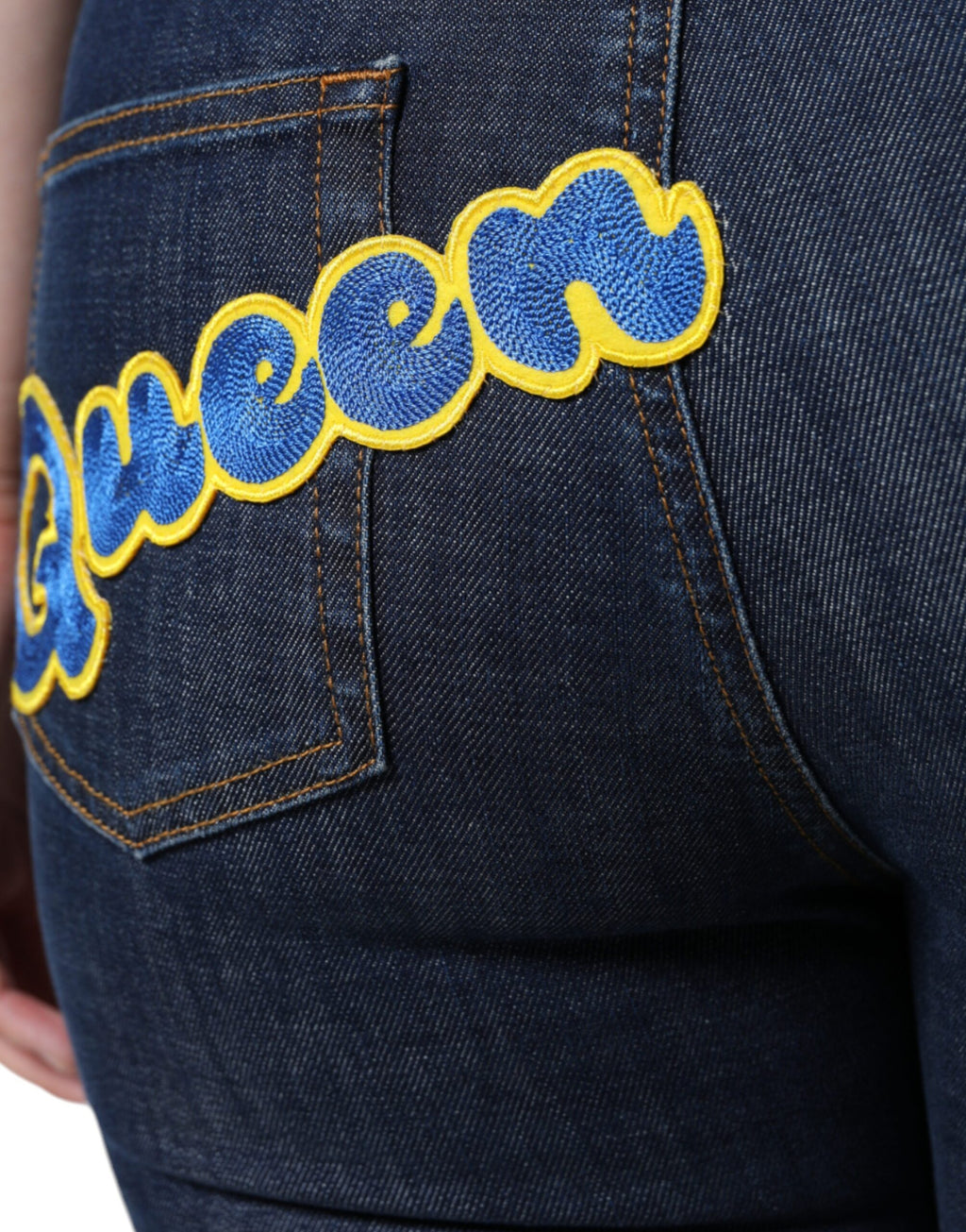 Jeans skinny en coton bleu foncé Dolce & Gabbana Queen, coupe ajustée et détails classiques visibles sur la photo.