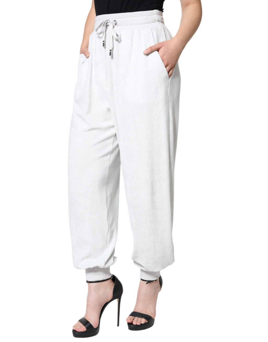 Pantalon de jogging blanc en nylon Dolce & Gabbana, design décontracté et confortable avec logo de la marque visible.