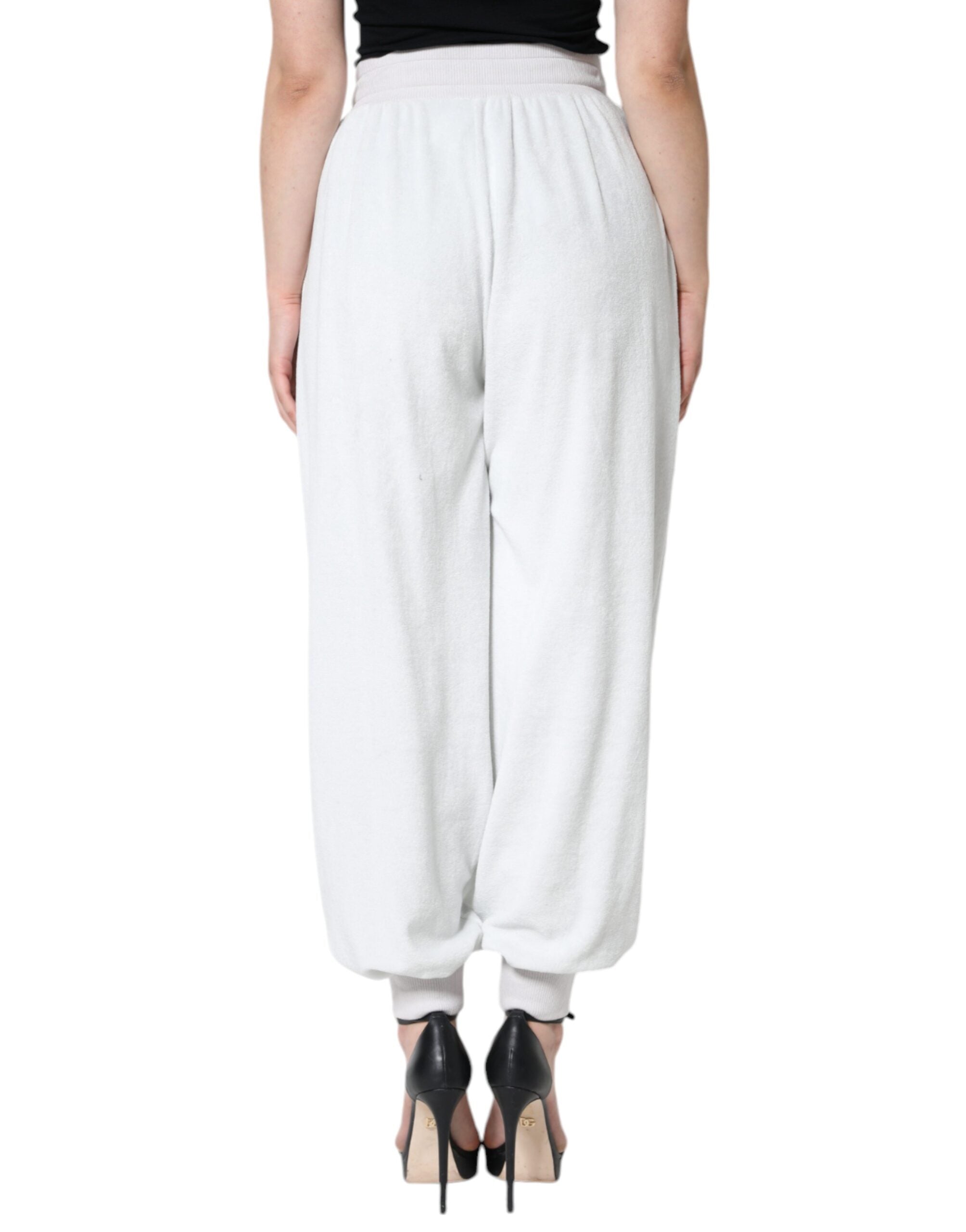 Pantalon de jogging blanc en nylon Dolce & Gabbana, pantalon décontracté avec cordon de serrage et poches latérales.