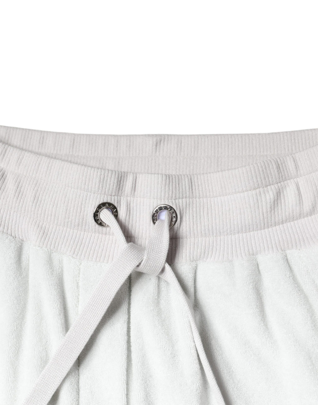 Pantalon jogging blanc en nylon de Dolce & Gabbana, style décontracté avec ceinture élastique et poches latérales.