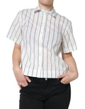 Polo à manches courtes Dolce & Gabbana blanc avec rayures, col classique, tissu léger et élégant.