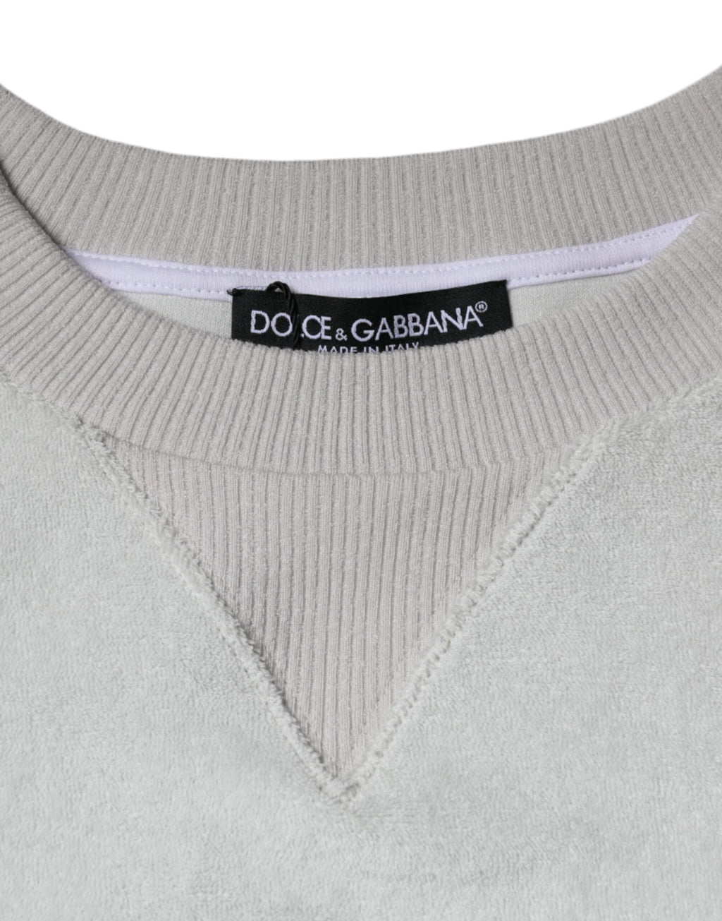 Pull à col ras du cou en nylon blanc de Dolce & Gabbana, pull-over stretch élégant et confortable, visible sur l'image.