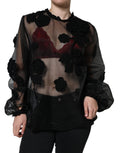 Blouse transparente en nylon à motifs floraux noirs de Dolce & Gabbana, détails en mesh et design élégant.