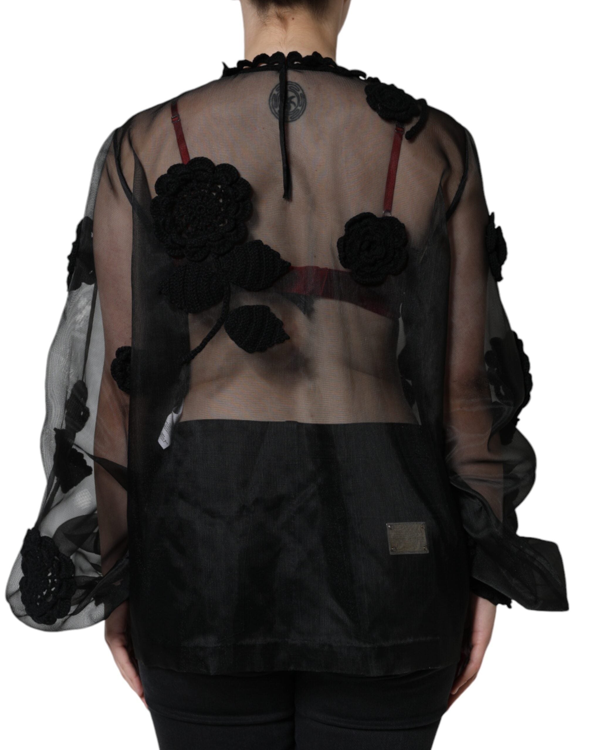 Blouse transparente en nylon à motifs floraux noirs de Dolce & Gabbana, design élégant et féminin.