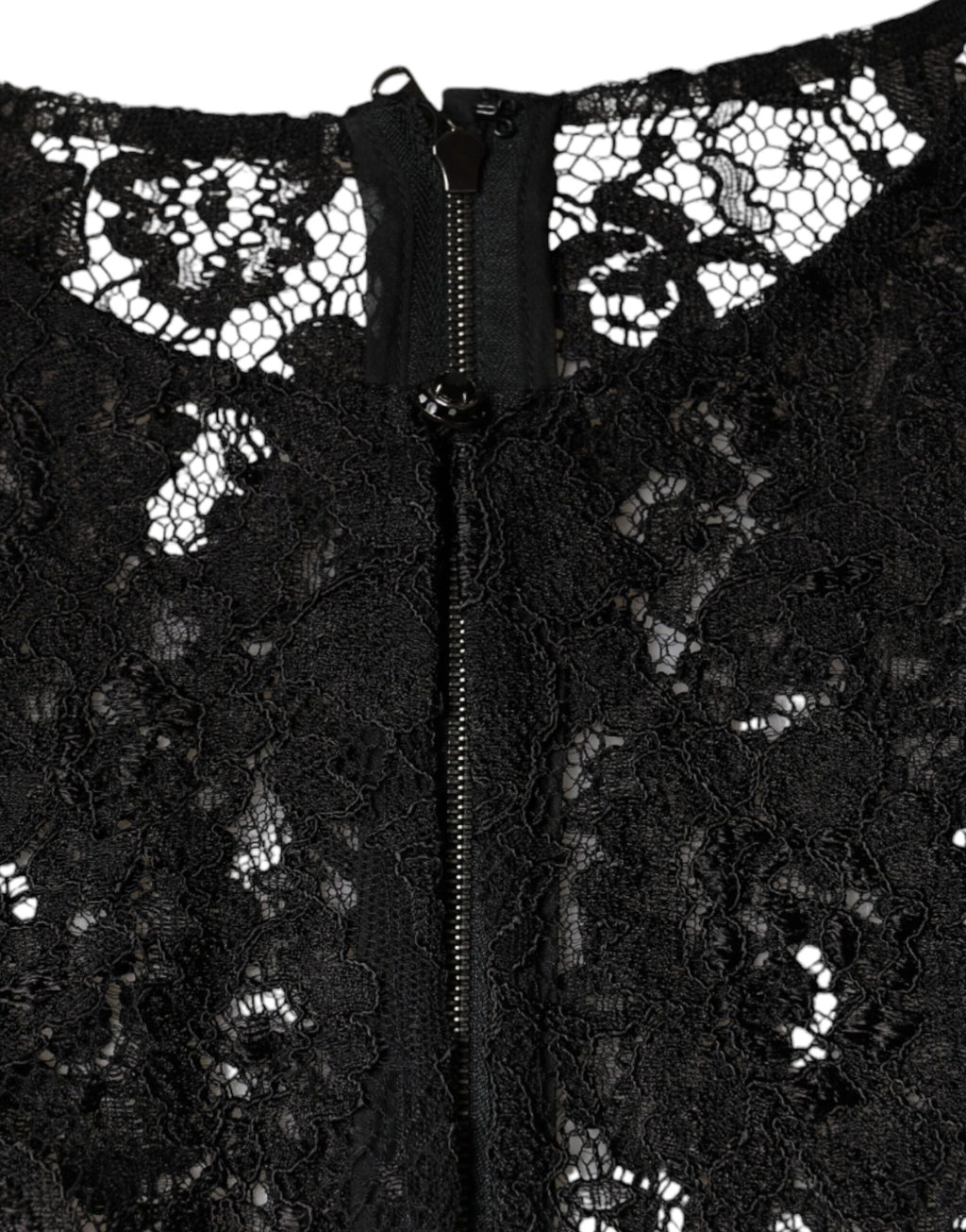 Top en dentelle florale noire à manches longues de Dolce & Gabbana, transparent et élégant.