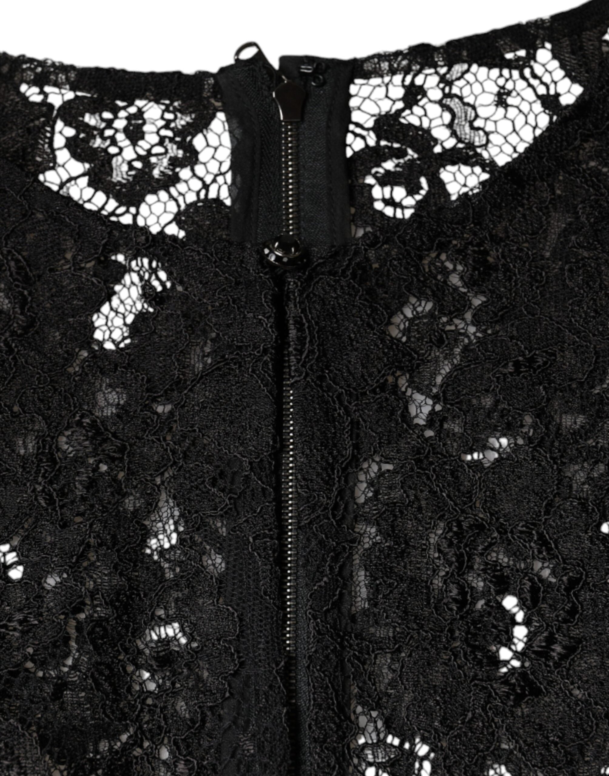 Top en dentelle florale noire à manches longues de Dolce & Gabbana, transparent et élégant.