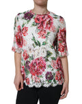 Blouse Dolce & Gabbana en dentelle blanche à manches courtes et col en peonie, élégante et raffinée.